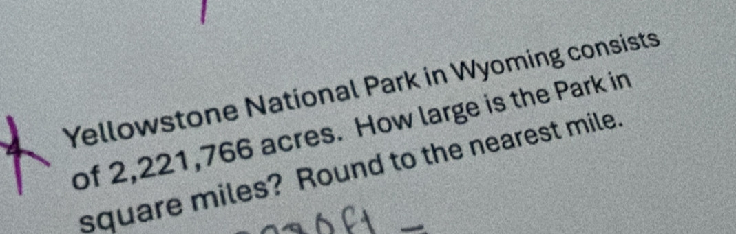 Yellowstone National Park in Wyoming consists 
of 2,221,766 acres. How large is the Park in
square miles? Round to the nearest mile.