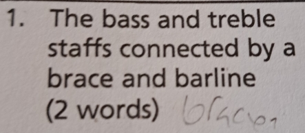 The bass and treble 
staffs connected by a 
brace and barline 
(2 words)