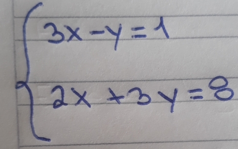 beginarrayl 3x-y=1 2x+3y=8endarray.