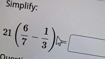 Simplify:
21( 6/7 - 1/3 )=□