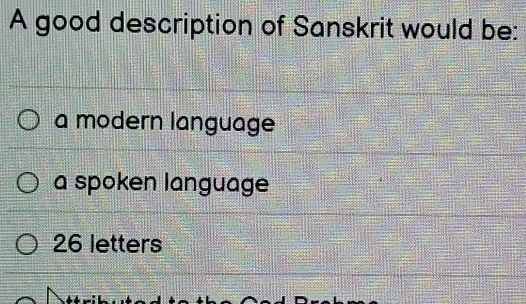 A good description of Sanskrit would be:
a modern language
a spoken language
26 letters