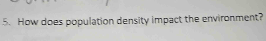 How does population density impact the environment?