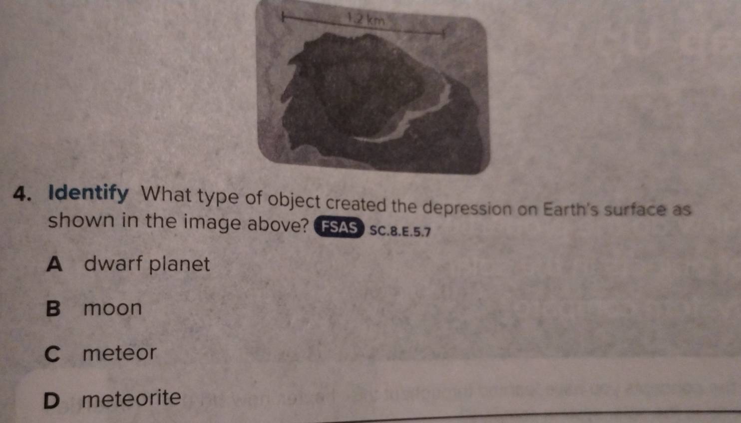 Solved: Identify What type of object created the depression on Earth's ...