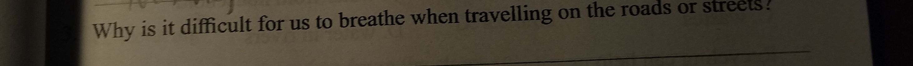 Why is it difficult for us to breathe when travelling on the roads or streets?