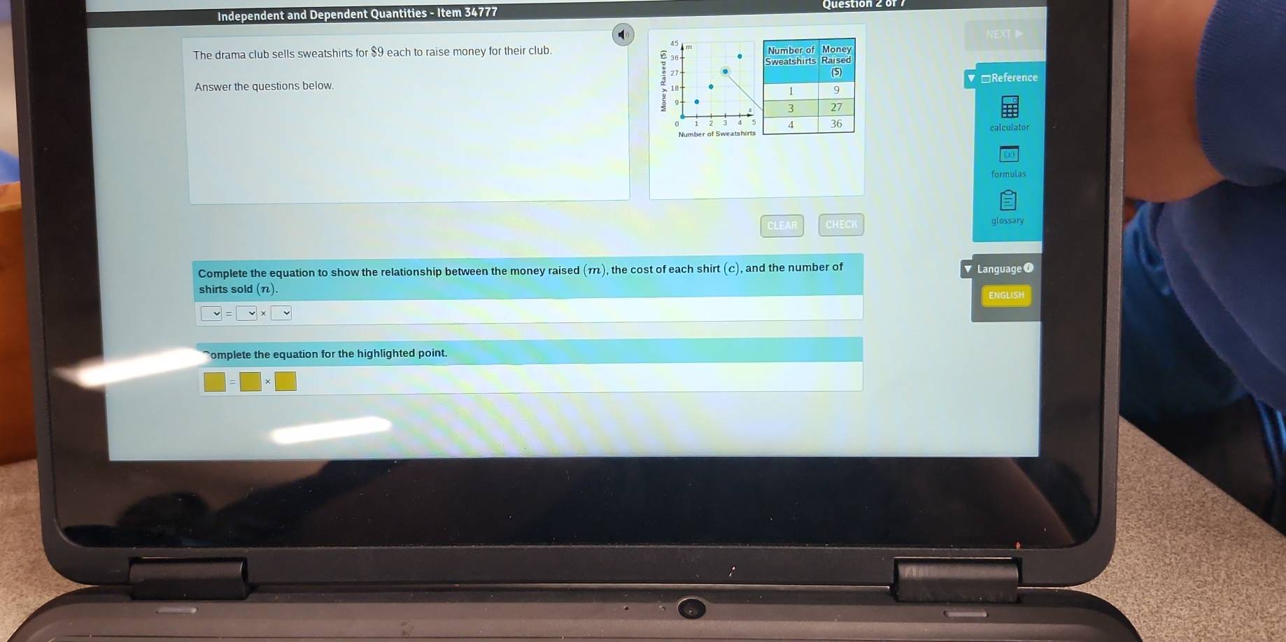 Independent and Dependent Quantities - Item 34777 
NEXT 
The drama club sells sweatshirts for $9 each to raise money for their club 
Answer the questions below. Reference 
calculator 
Number of Sweatshirts 
formulas 
CLEAR glossary 
Complete the equation to show the relationship between the money raised (π), the cost of each shirt (c), and the number of Language 0 
shirts sold ()
□ =□ * □ ENGLISH 
omplete the equation for the highlighted point.
□ =□ * □