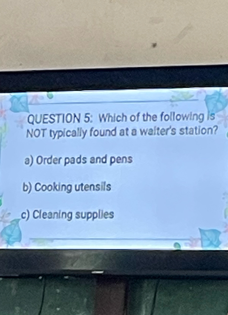 Which of the following is
NOT typically found at a waiter's station?
a) Order pads and pens
b) Cooking utensils
c) Cleaning supplies