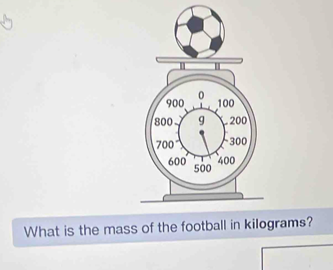 What is the mass of the football in kilograms?