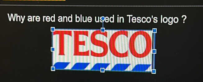 Why are red and blue used in Tesco's logo ? 
(