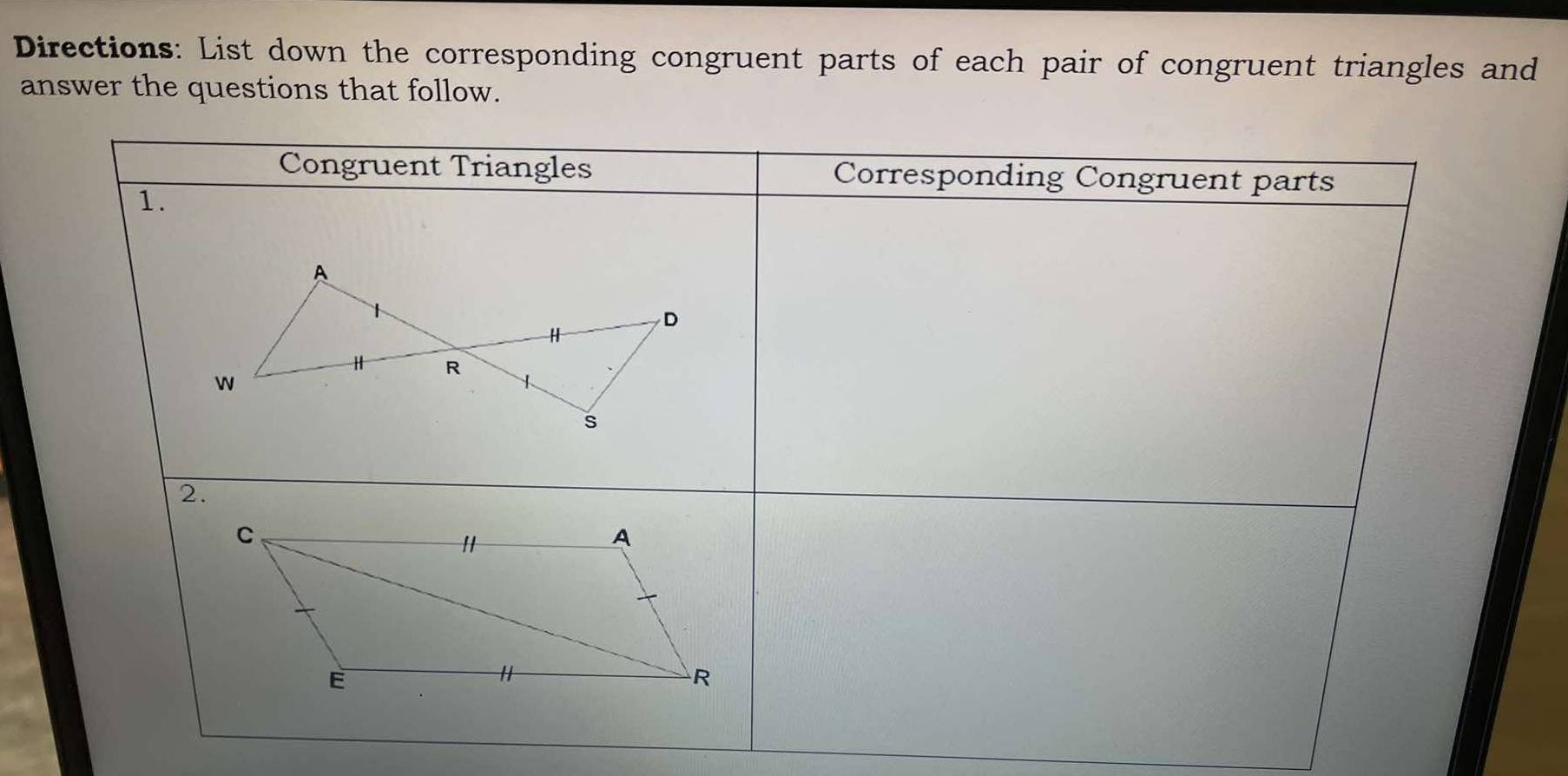 Directions: List down the corresponding congruent parts of each pair of congruent triangles and 
answer the questions that follow.