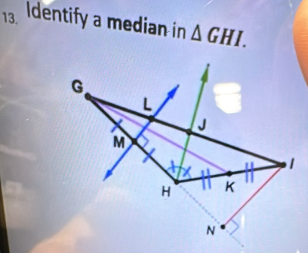 Identify a median in △ GHI.
G
J
M
1
H K
N