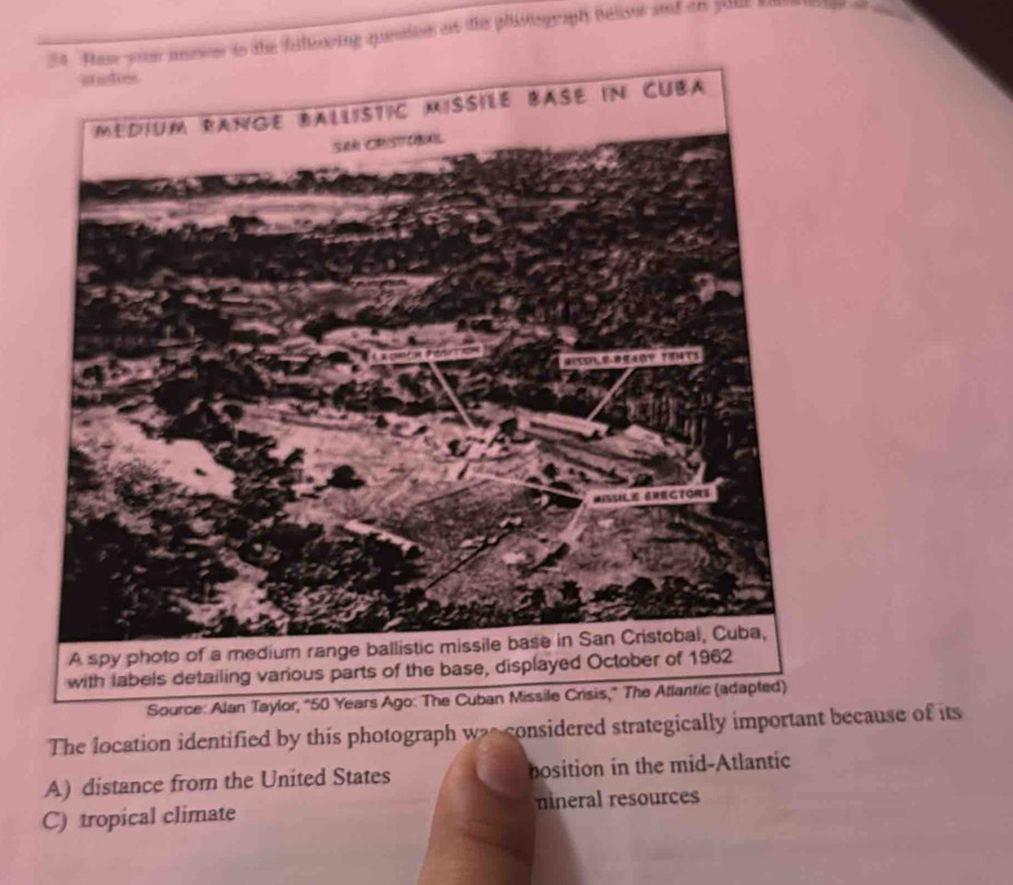 Tew you aneee to the filtering question an the phistograph belisor and on jil? B
The location identified by this photograph waconsidered strategically important because of its
A) distance from the United States bosition in the mid-Atlantic
C) tropical climate mineral resources