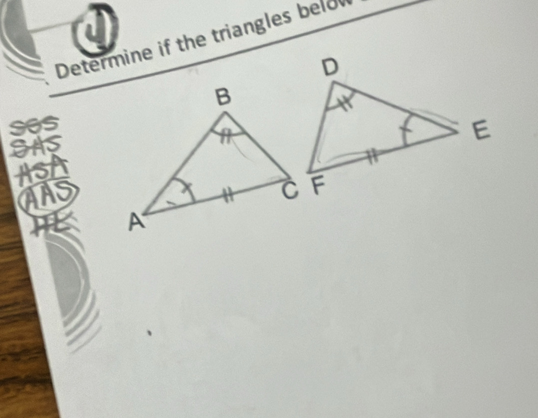 Determine if the triangles below 
ay 
CAS