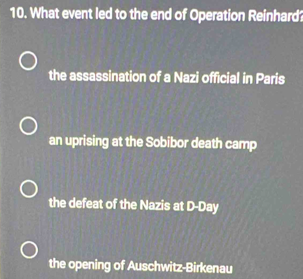 What event led to the end of Operation Reinhard?
the assassination of a Nazi official in Paris
an uprising at the Sobibor death camp
the defeat of the Nazis at D-Day
the opening of Auschwitz-Birkenau