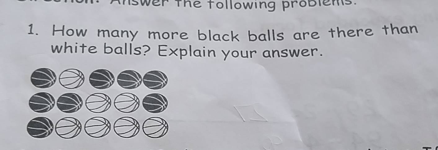 wer the following problems. 
1. How many more black balls are there than 
white balls? Explain your answer.