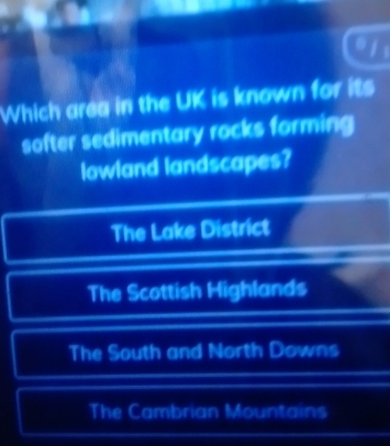 Which area in the UK is known for its
softer sedimentary rocks forming
lowland landscapes?
The Lake District
The Scottish Highlands
The South and North Downs
The Cambrian Mountains