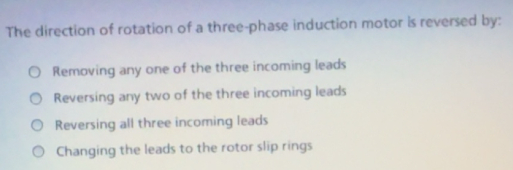 Solved: The direction of rotation of a three-phase induction motor is ...