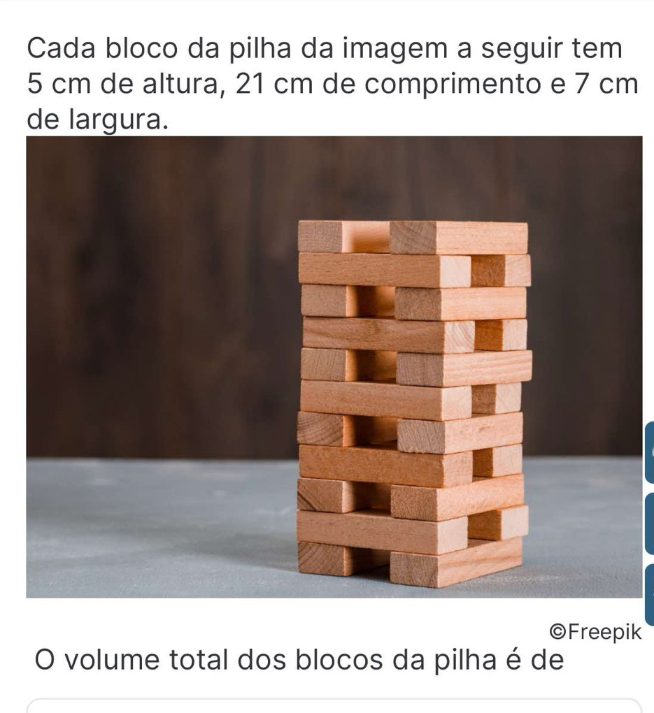 Cada bloco da pilha da imagem a seguir tem
5 cm de altura, 21 cm de comprimento e 7 cm
de largura. 
©Freepik 
O volume total dos blocos da pilha é de