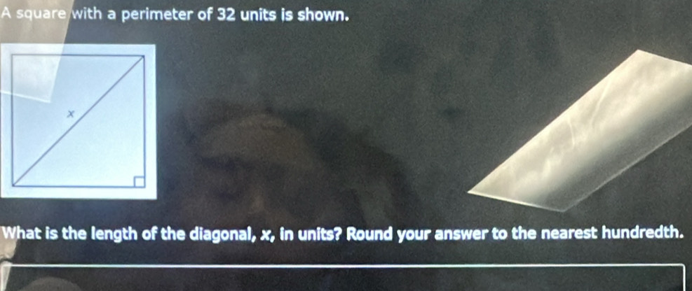 A square with a perimeter of 32 units is shown. 
What is the length of the diagonal, x, in units? Round your answer to the nearest hundredth.