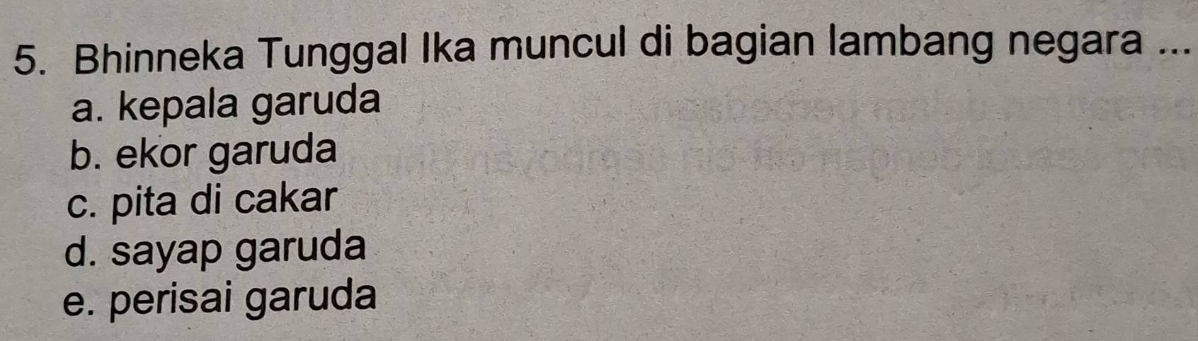 Bhinneka Tunggal Ika muncul di bagian lambang negara ...
a. kepala garuda
b. ekor garuda
c. pita di cakar
d. sayap garuda
e. perisai garuda