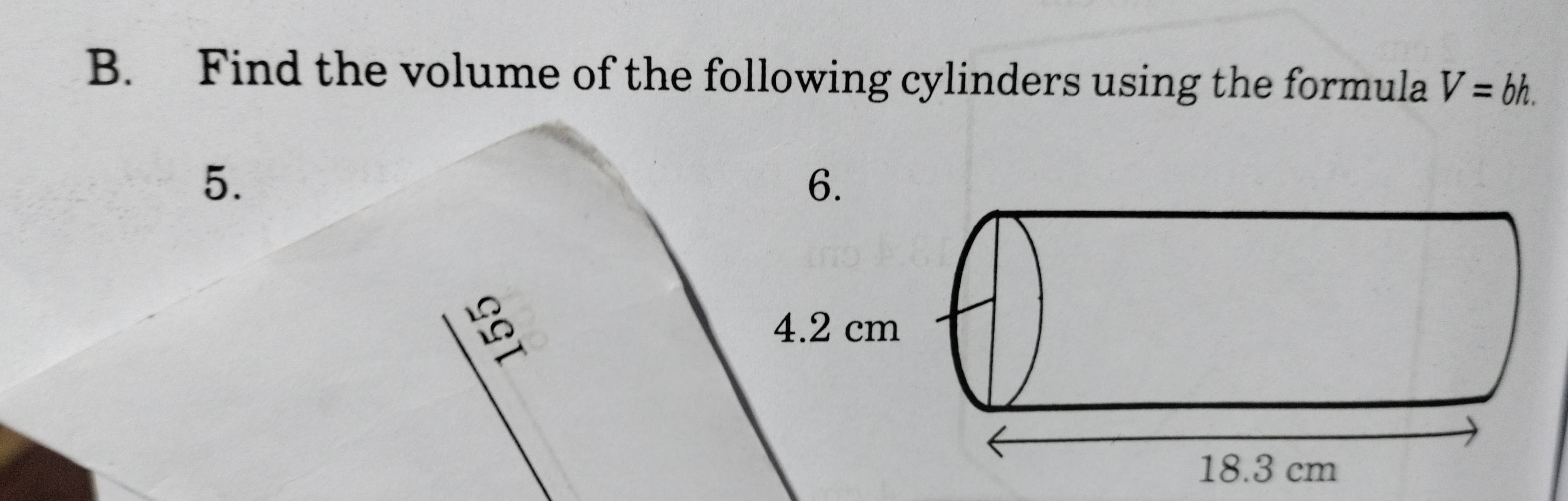 Find the volume of the following cylinders using the formula V=bh. 
5. 
6. 
4.2