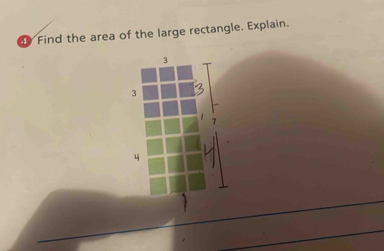 Find the area of the large rectangle. Explain.