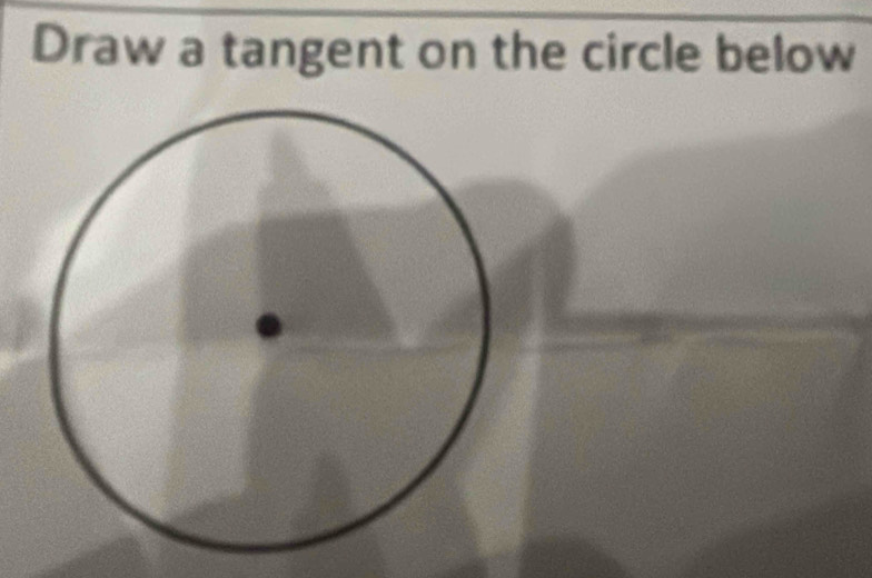 Draw a tangent on the circle below