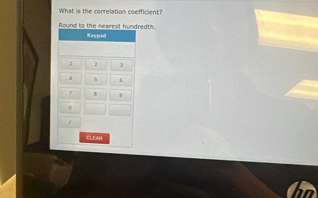 What is the correlation coefficient? 
Round tredth.