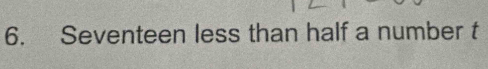 Seventeen less than half a number t