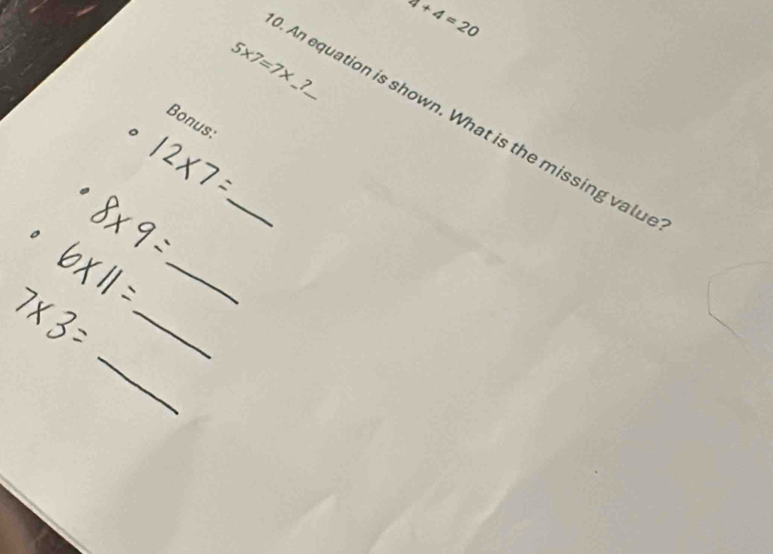 4+4=20
5* 7=7*
_An equation is shown. What is the missing valu 
Bonus: 
_ 
_ 
_