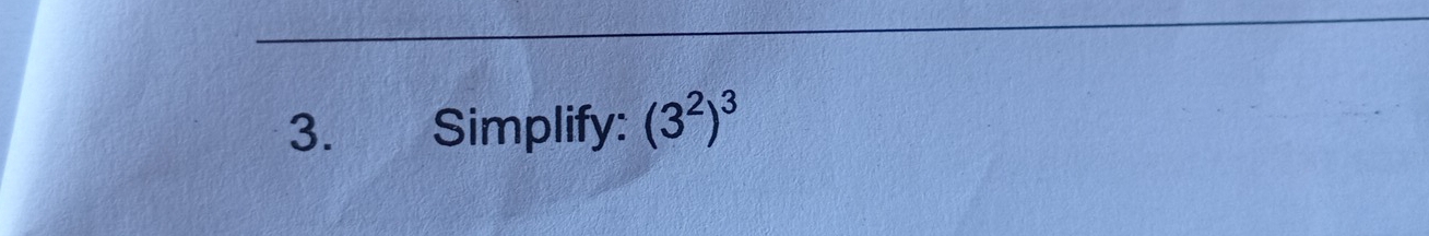 Simplify: (3^2)^3