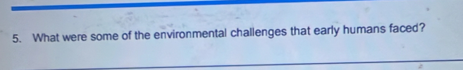 What were some of the environmental challenges that early humans faced?