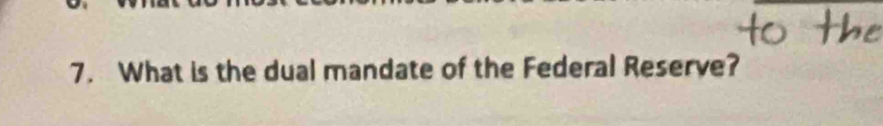 What is the dual mandate of the Federal Reserve?