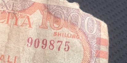 SHILLINGS
909875