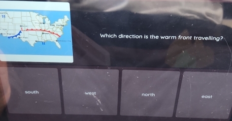 Which direction is the warm front travelling?
south west north east