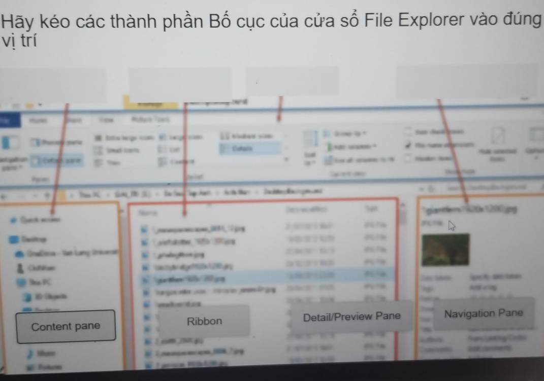 Hãy kéo các thành phần Bố cục của cửa số File Explorer vào đúng 
vi trí 
=das == 
F 
20.jpg 

Ceitoy 
* Oralesa - Vue Lưng Drero 

t e 
Content pane Ribbon Detail/Preview Pane Navigation Pane 
Hhum