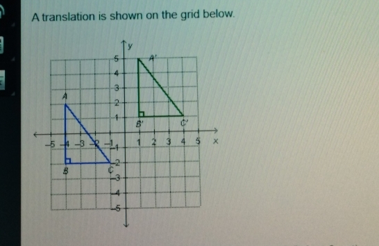 A translation is shown on the grid below.