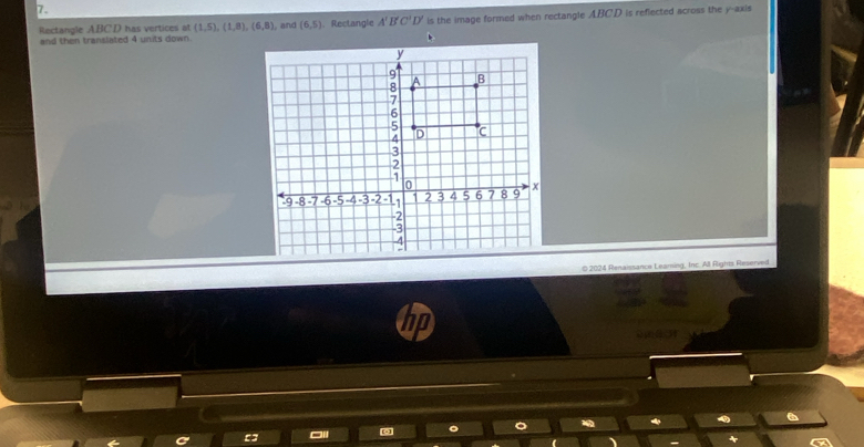 Rectangle ABCD has vertices (1,5), (1,8), (6,8) , and (6,5). Rectangle A'B'C'D' is the image formed when rectangle ABCD is reflected across the y-axis 
and then translated 4 units down . 
0 2024 Renaissance Leaming, Inc. All Rights Reserved 
6