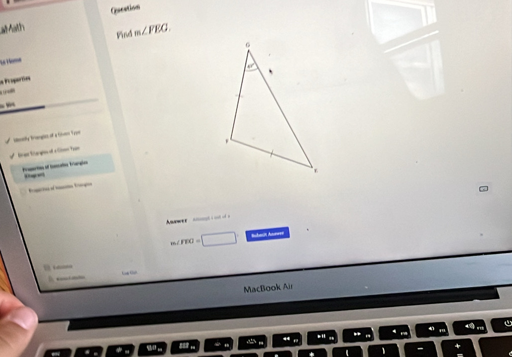 Question
aMath
Find m∠ FEG.
La Hame
dn Proparties
  
== Mên
ilnsity Triangics of a Geeo Typs
Graar friangies of a Gnvon Paan
Prapartins of tmnsatos Triangics
egrs
Ecogicioas of Inssites Triaçtas
Annwer   Angs
m∠ FEG= Submit Anewer
Loế Gại
MacBook Air
U
4 F12
-1 D