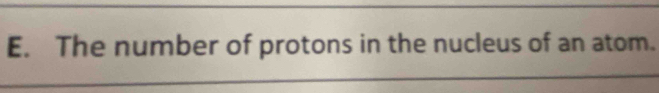 The number of protons in the nucleus of an atom.