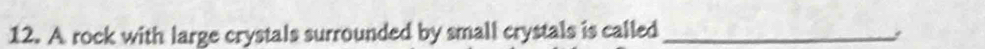 A rock with large crystals surrounded by small crystals is called_