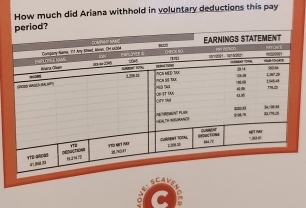 How much did Ariana withhold in voluntary deductions this pay 
d? 
A