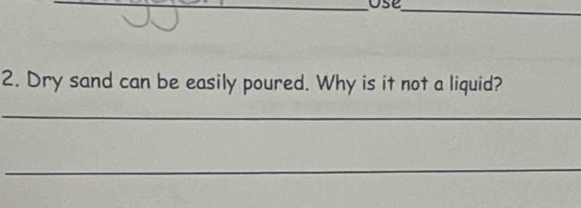 Dry sand can be easily poured. Why is it not a liquid? 
_ 
_