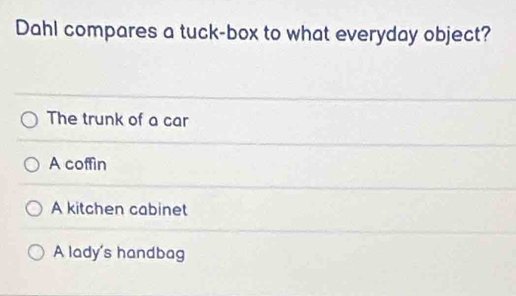 Dahl compares a tuck-box to what everyday object?
The trunk of a car
A coffin
A kitchen cabinet
A lady's handbag