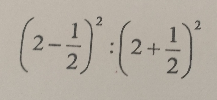 (2- 1/2 )^2:(2+ 1/2 )^2