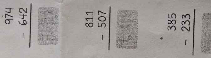 beginarrayr^((974) -642 hline □ endarray)
frac beginarrayr 811 -507endarray □ □ 
beginarrayr 385 -233 hline endarray