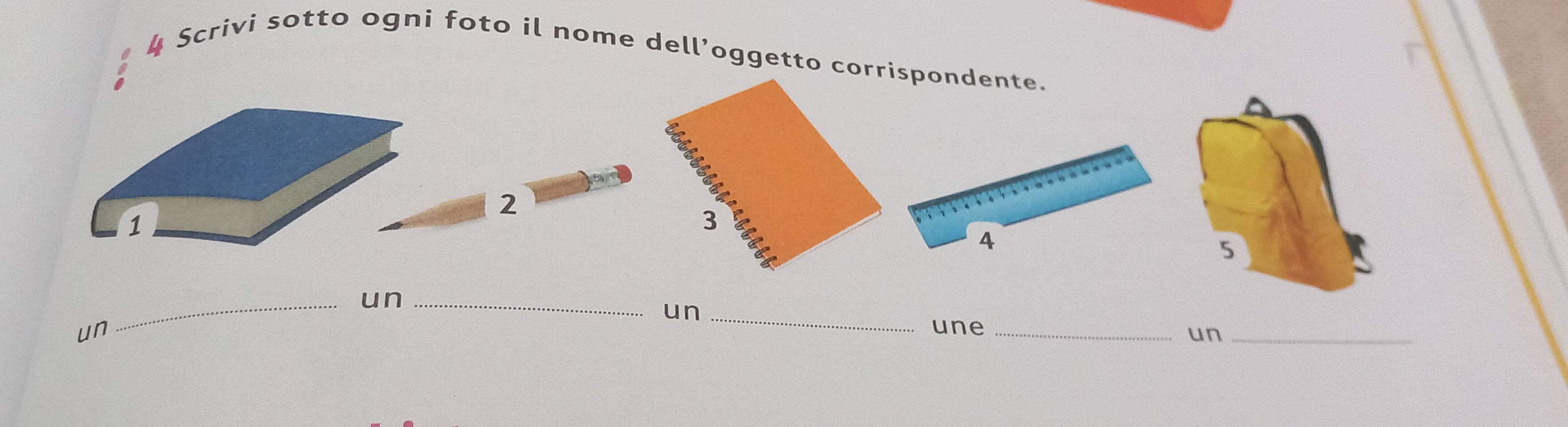 Scrivi sotto ogni foto il nome dell’oggetto corrispondente.
2
1
4
_un_ 
un_ 
un 
une_ 
un_