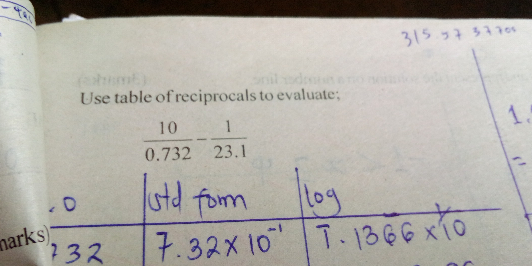 Use table of reciprocals to evaluate;
 10/0.732 - 1/23.1 
harks)