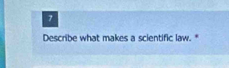 Describe what makes a scientific law. *