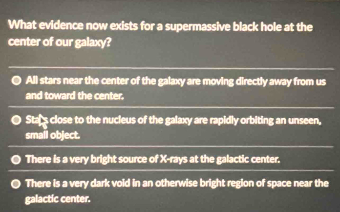 Solved: What evidence now exists for a supermassive black hole at the ...