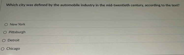 Which city was defned by the automobile industry in the mid-twentieth century, according to the text?
New York
Pittsburgh
Detroit
Chicago